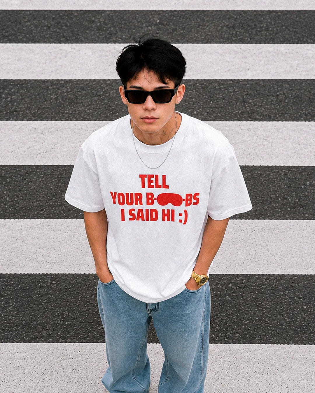 White oversized “Tell Your Boobs I Said Hi :)” graphic t-shirt