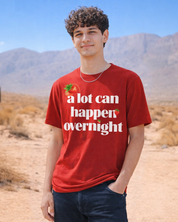     Red oversized graphic t-shirt with “A Lot Can Happen Overnight” print
